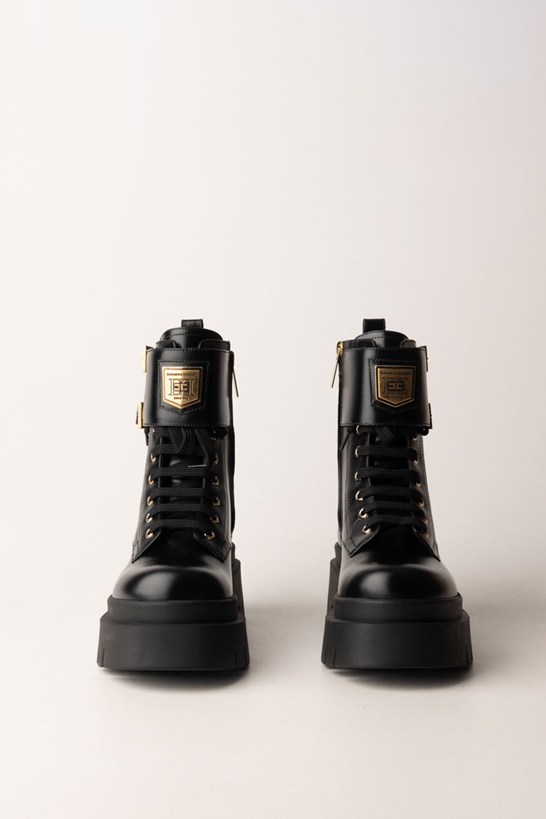 Botas militares de piel con placa con logo