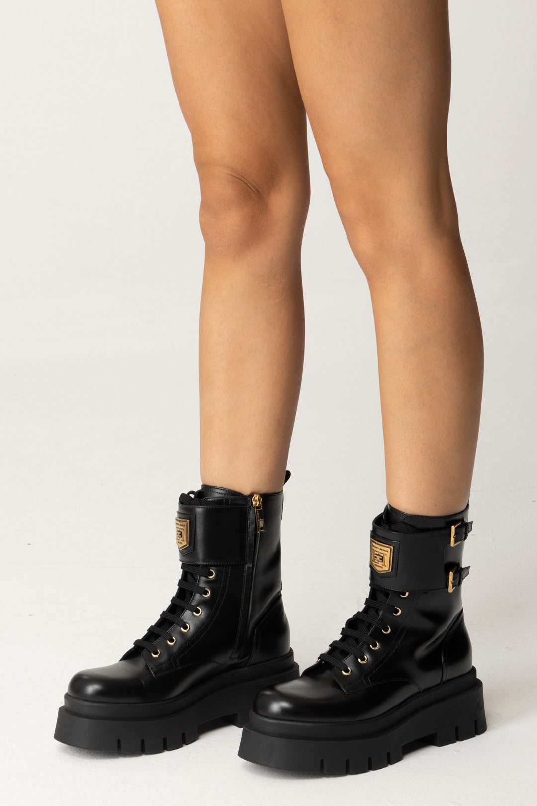 Combat boots en cuir avec plaque logo