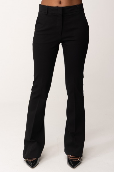 Manila Grace  Flared trousers with logo plaque P093VU NERO